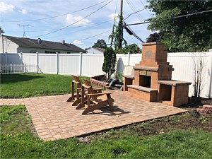 Nicolock mini verona fire place fireplace golden brown patio wood boxes_1